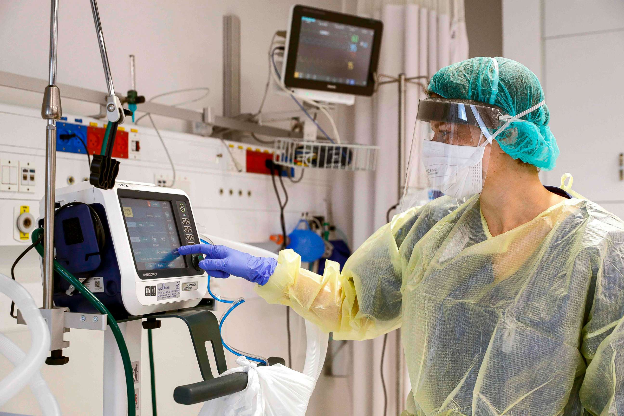 PHOTO: A doctor checks a medical ventilator control panel in a hospital ward during a press presentation at Samson Assuta Ashod University Hospital in Ashdod, Israel, March 16, 2020.