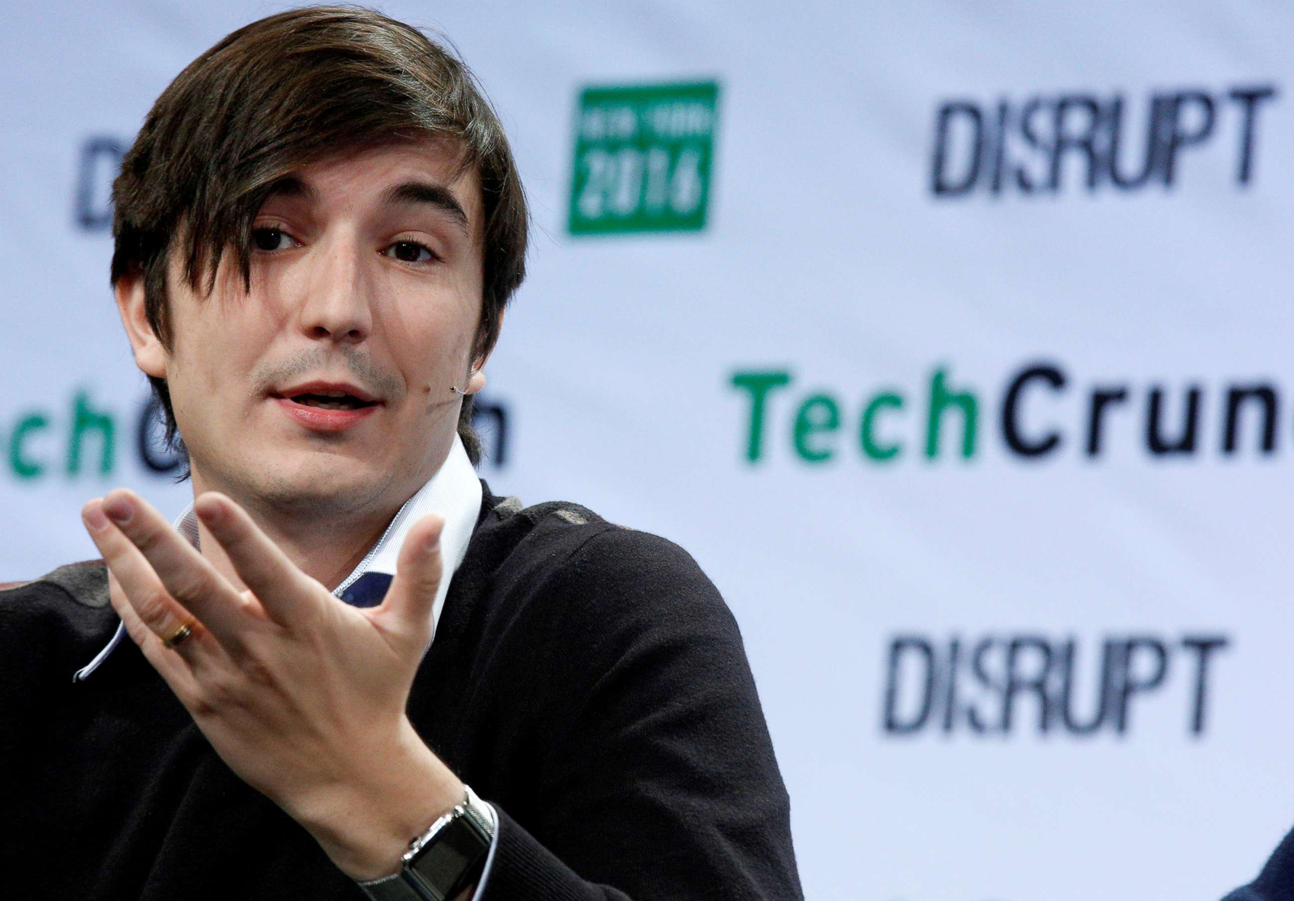 PHOTO: Vlad Tenev, co-founder and co-CEO of investing app Robinhood, speaks during the TechCrunch Disrupt event in New York, May 10, 2016.