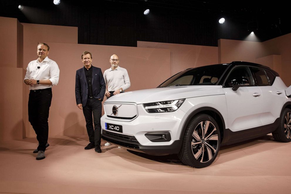PHOTO: Volvo executives stand for a photograph next to the XC40 Recharge electric sports utility vehicle during an unveiling event in Los Angeles, Oct. 16, 2019.