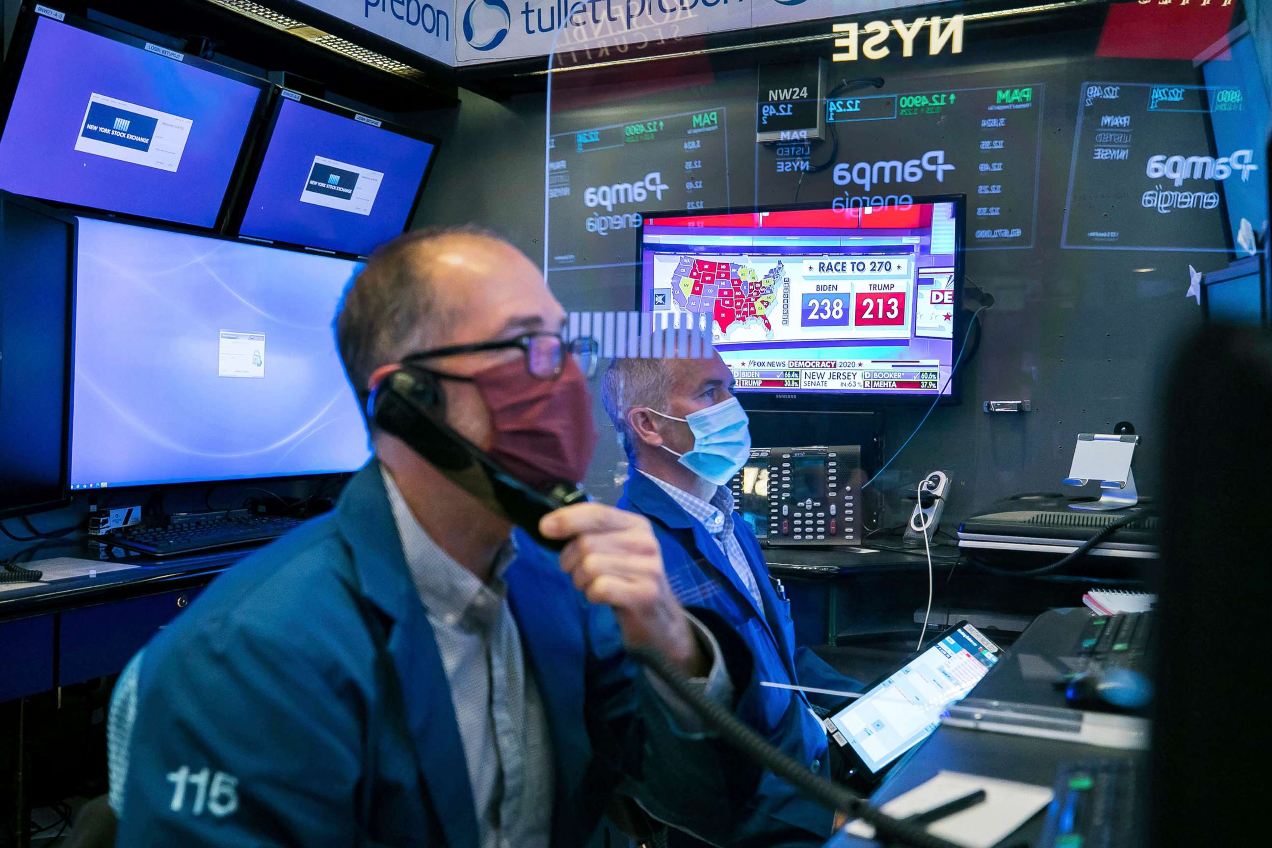 PHOTO: This photo provided by the New York Stock Exchange shows activity on the trading floor, Nov. 4, 2020.
