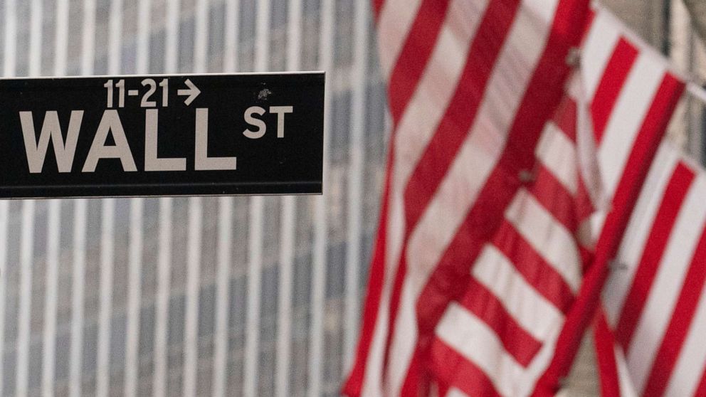 PHOTO: A street sign for Wall Street is seen outside the New York Stock Exchange, Nov. 5, 2020.