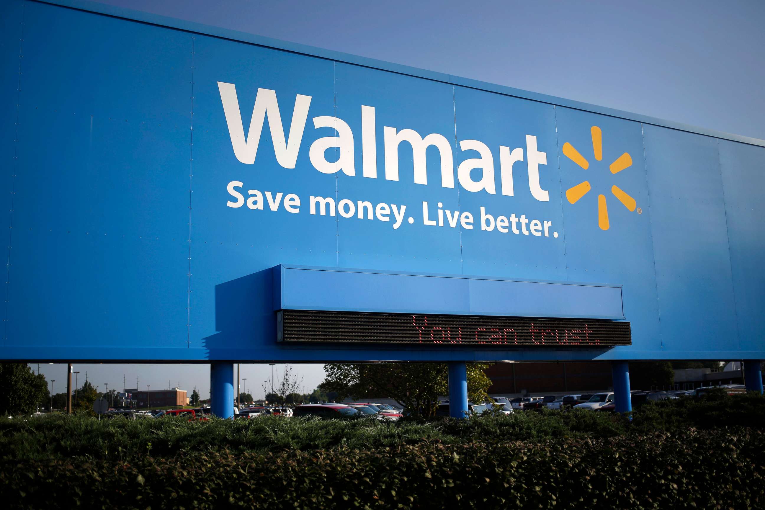 PHOTO: Signage is displayed outside of the Wal-Mart Stores Inc. headquarters building in Bentonville, Arkansas, July 29, 2015.