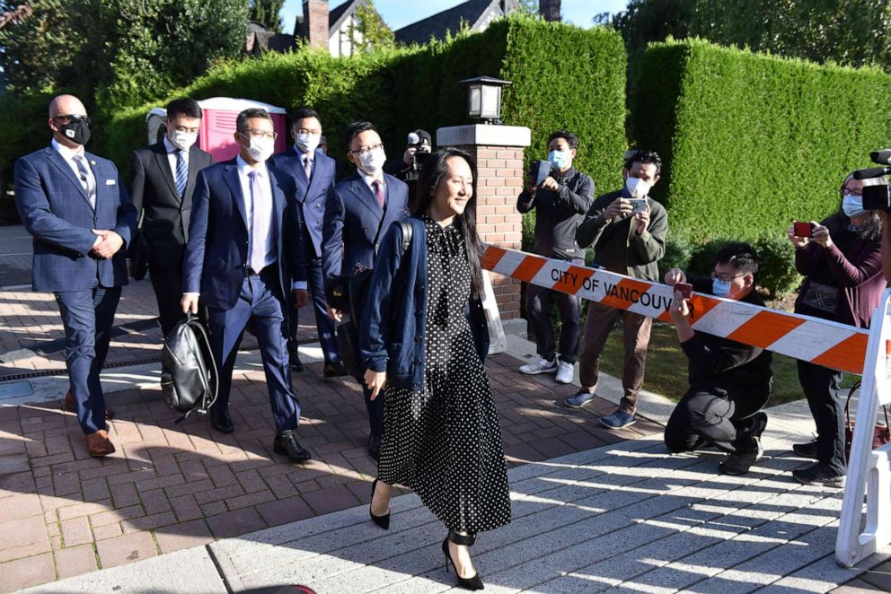 PHOTO: Huawei Chief Financial officer Meng Wanzhou leaves her Vancouver home to attend her extradition hearing, Sept. 24, 2021, in Vancouver, Canada.