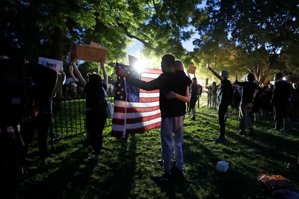 PHOTO: Demonstrators gather to protest the death of George Floyd, May 31, 2020, near the White House in Washington, D.C.