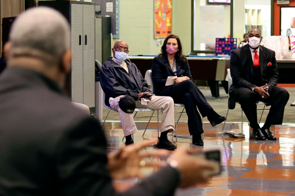 PHOTO: Gov. Gretchen Whitmer, second from right, visits Benton Harbor, Mich., Oct. 19, 2021, to listen to residents who have been urged to use bottled water because of elevated levels of lead in their tap water.