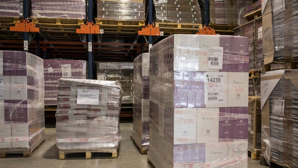 PHOTO: In this Oct. 10, 2019, file photo, wine cases ready for shipment sit in a warehouse in Le Cannet-des-Maures, in the Provence region of France.