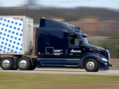 Autonomous truck company Aurora delays hauling freight without human drivers until April