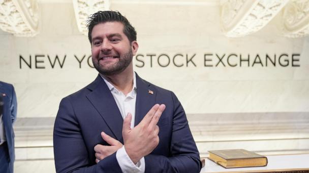 GrabAGun CEO Marc Nemati poses for a picture on the floor at the New York Stock Exchange in New York, Wednesday, July 16, 2025. (AP Photo/Seth Wenig)