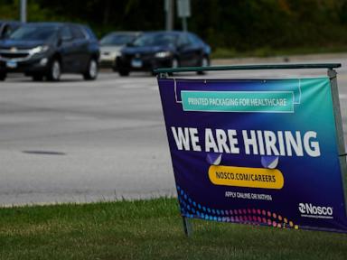 Number of Americans seeking jobless benefits falls as employers hold on to workers