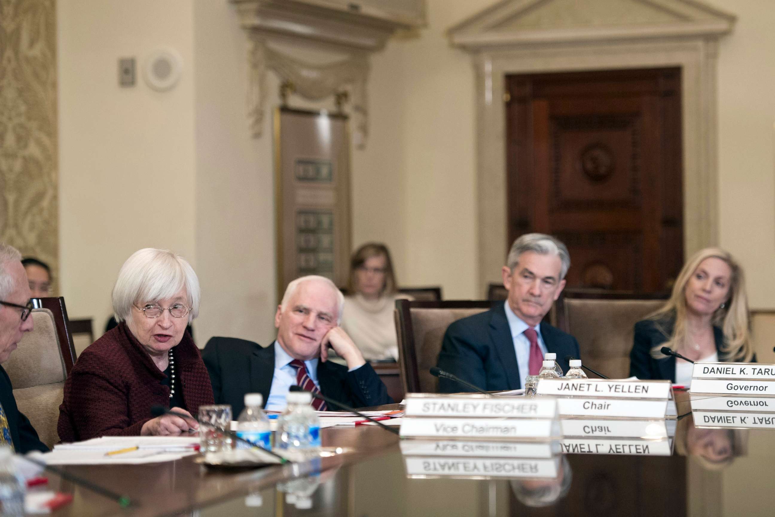 PHOTO: Federal Reserve Board Chair Janet Yellen, second from left, oversees an open meeting of the board with board members; Vice Chair Stanley Fischer, Yellen, Daniel Tarullo, Jerome Powell, and Lael Brainard, in Washington, Dec. 15, 2016.