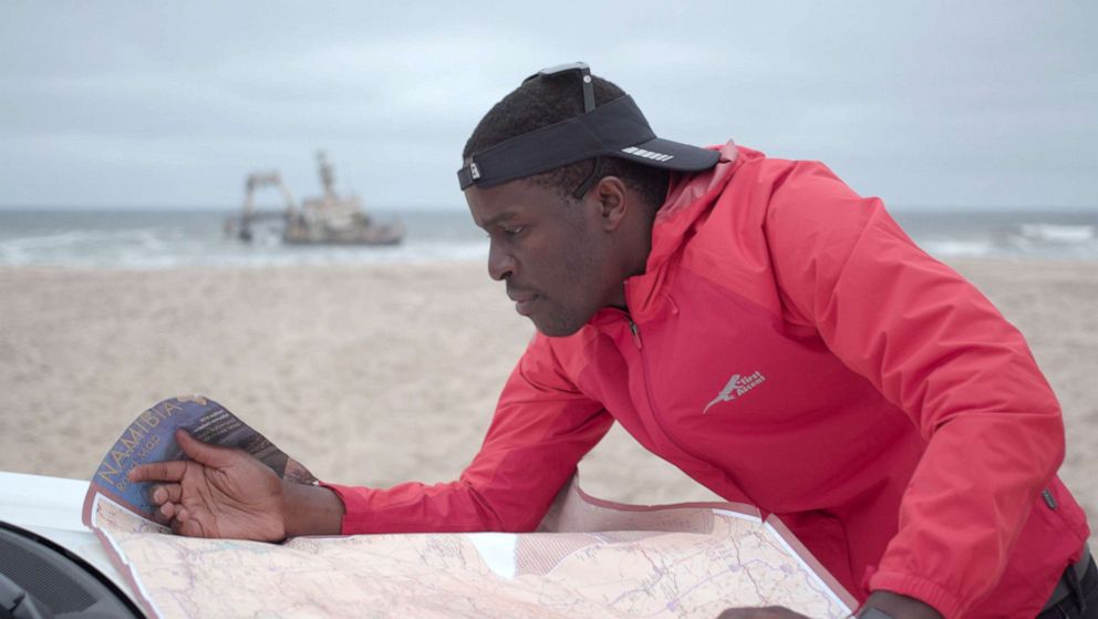 PHOTO: Tawanda Kanhema is pictured here planning a mapping route in Swakopmund, Namibia.