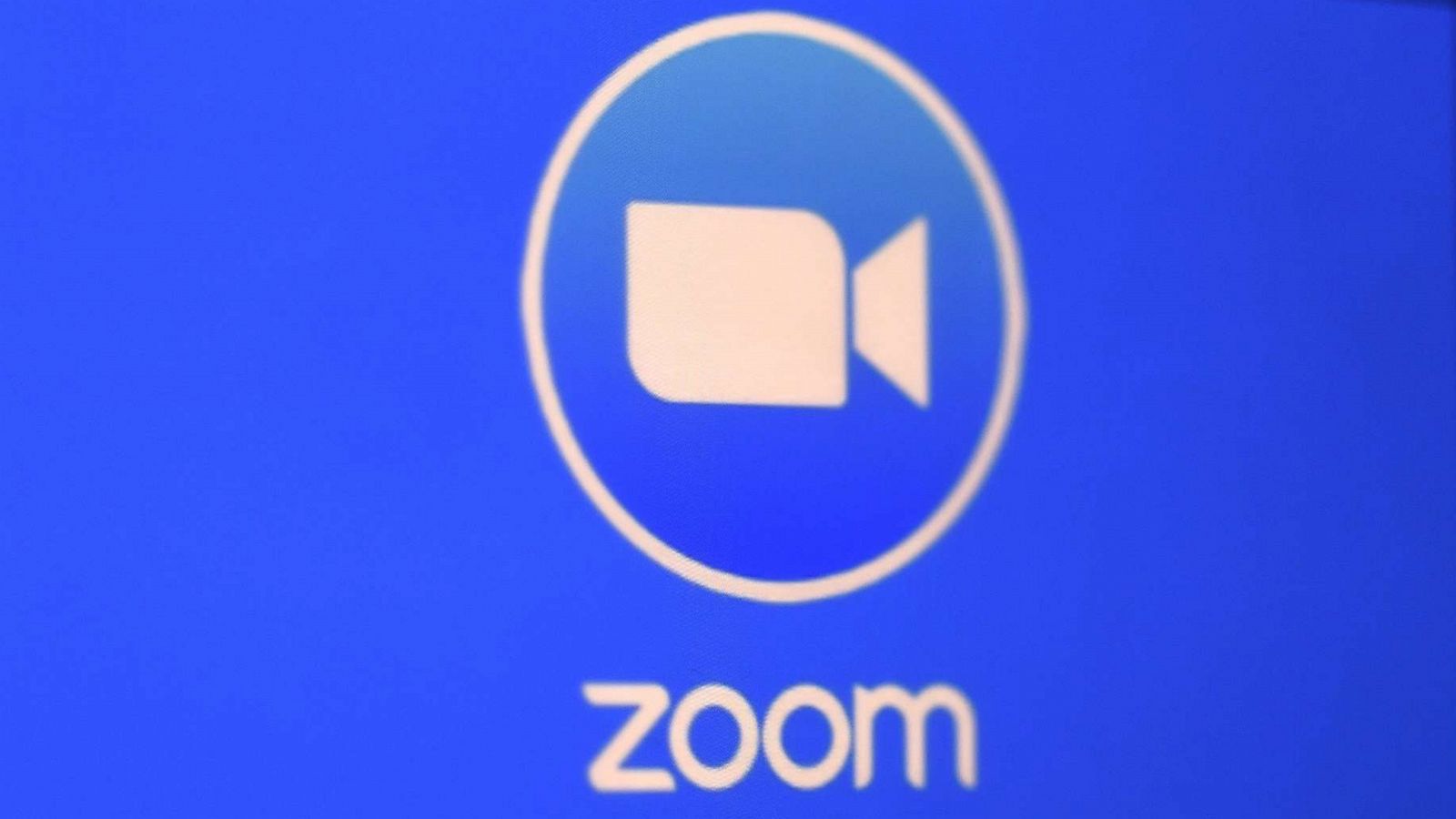 PHOTO: In this photo illustration a Zoom App logo is displayed on a smartphone, March 30, 2020, in Arlington, Va.