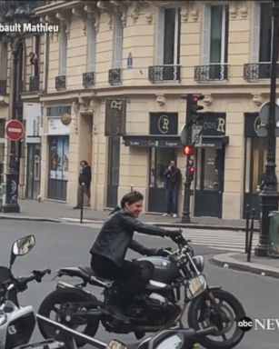 VIDEO: French film fans were delighted when Tom Cruise surprised them by riding on a motorcycle from underground in Paris while filming the newest "Mission: Impossible" movie.