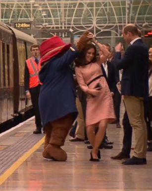 VIDEO: Kate, 35, danced with Paddington Bear, taking a twirl while holding the hand of the beloved children's character.