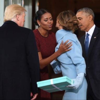 Michelle Obama explained what happened when Melania Trump handed her the gift.