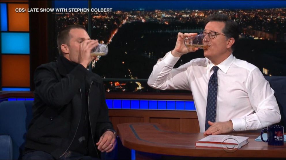 Beer chug: Tom Brady beats Stephen Colbert in seconds flat