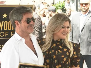 WATCH: Kelly Clarkson gives heartfelt thanks to Simon Cowell as he gets Walk of Fame star