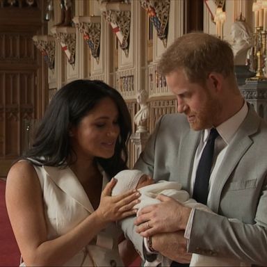 Prince Harry and Meghan spoke about who they think their baby resembles as they debuted him to the world at Windsor Castle.