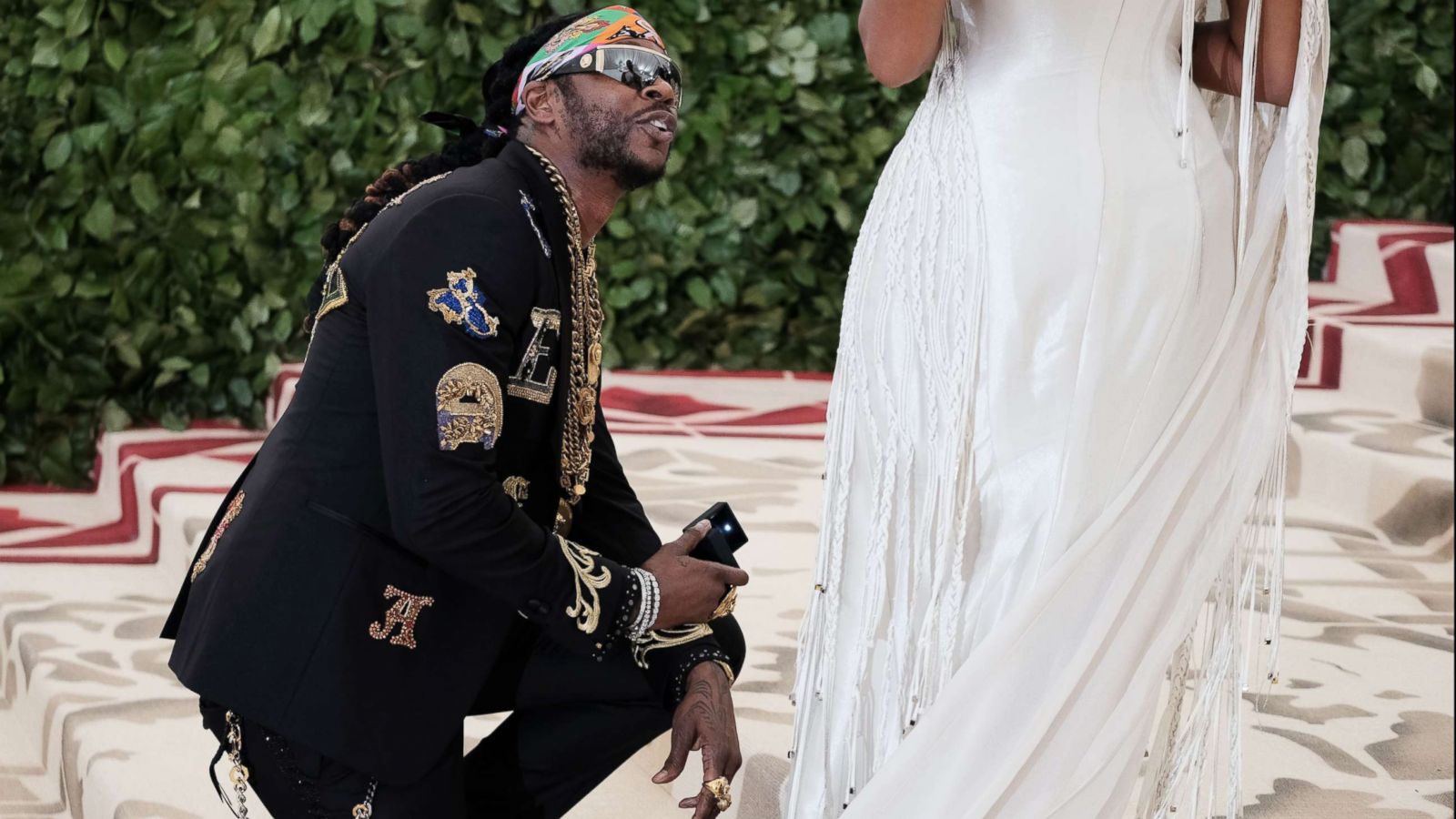 PHOTO: Rapper 2 Chainz proposes to his girlfriend on the red carpet at Met Gala celebrating the opening of Heavenly Bodies: Fashion and the Catholic Imagination, New York, May 7, 2018.