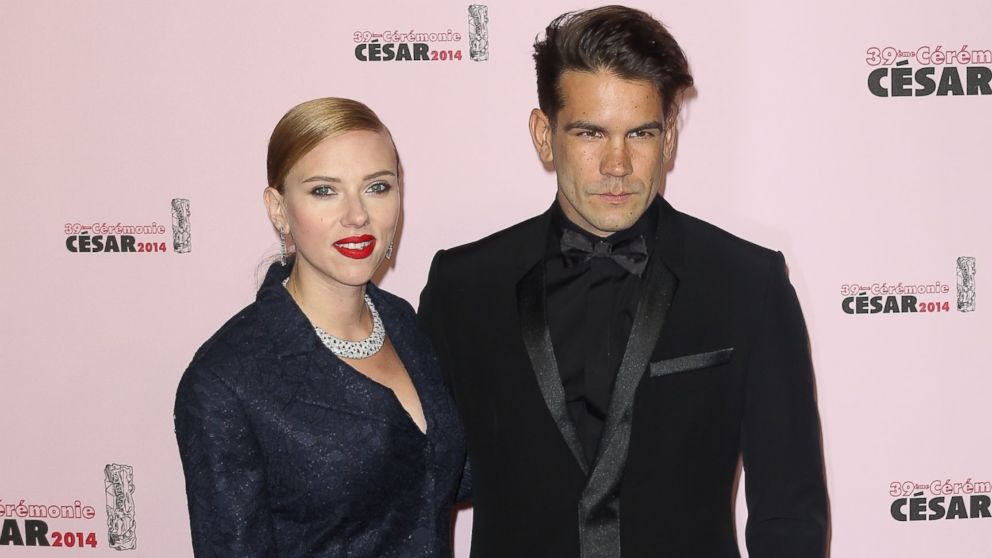 Scarlett Johansson and Romain Dauriac arrive for the 39th Cesar Film Awards 2014 at Theatre du Chatelet on Feb. 28, 2014. 