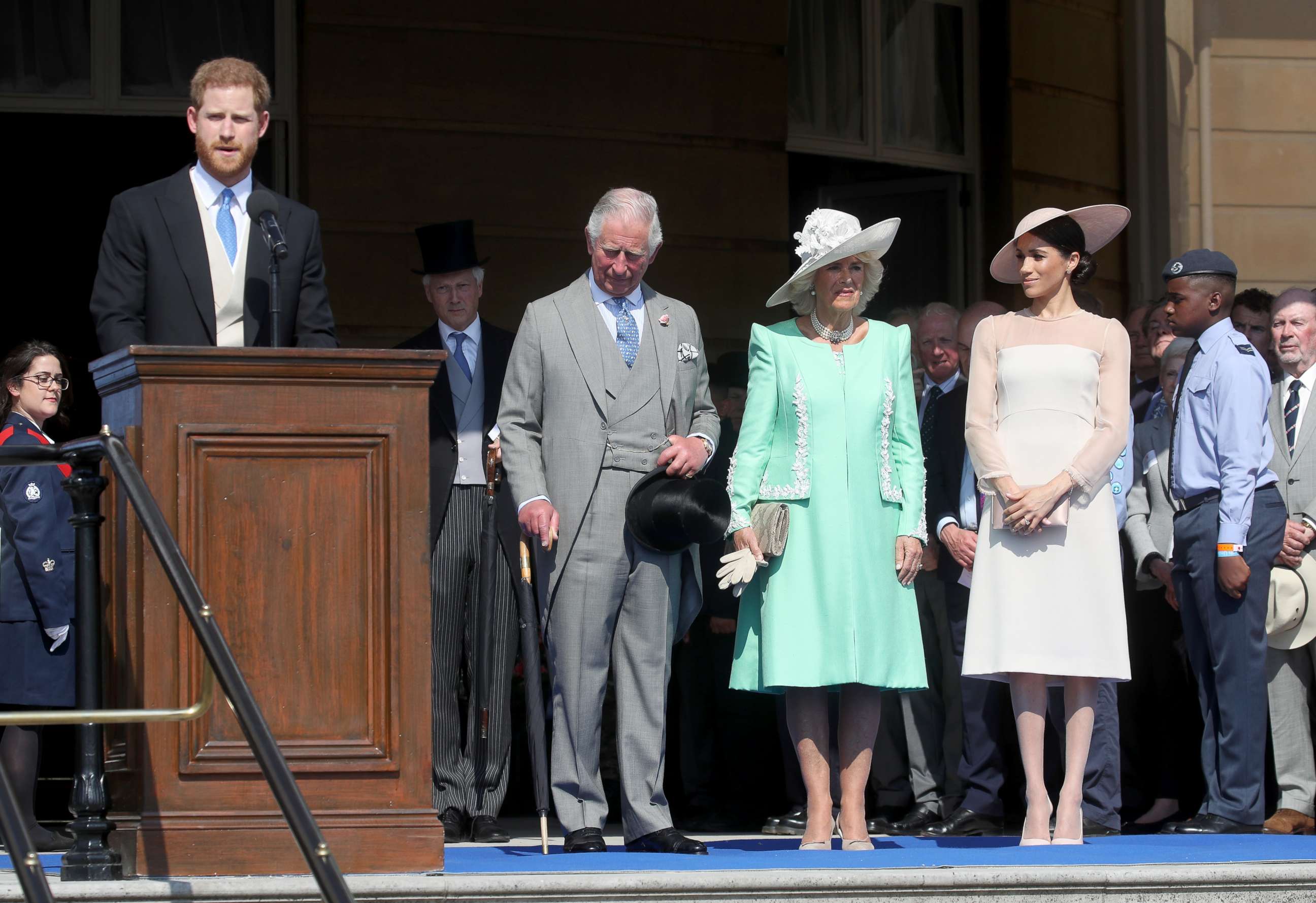 PHOTO: (L-R) Prince Harry, Duke of Sussex gives a speech next to Prince Charles, Prince of Wales, Camilla, Duchess of Cornwall and Meghan, Duchess of Sussex as they attend The Prince of Wales' 70th Birthday Patronage Celebration, May 22, 2018, in London.
