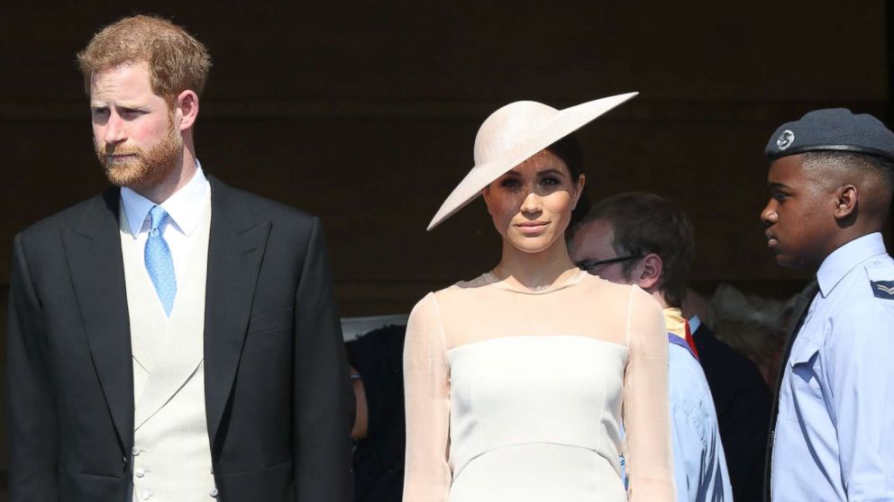 PHOTO: The Duke and Duchess of Sussex at the Prince of Wales' 70th Birthday Patronage Celebration in the gardens of Buckingham Palace in London.