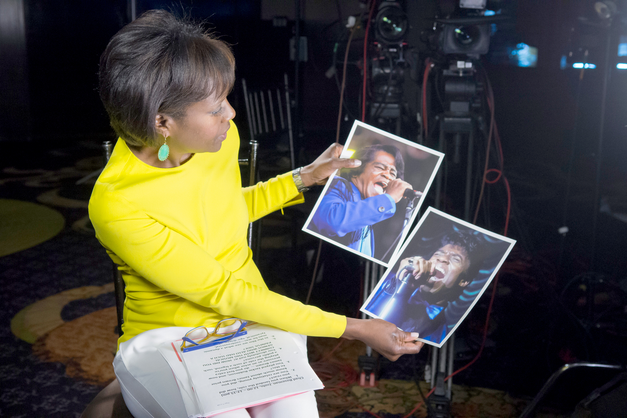 PHOTO: ABC's Deborah Roberts holds a photo of the real James Brown next to a photo of actor Chadwick Boseman playing the music legend in the new biopic, "Get On Up."