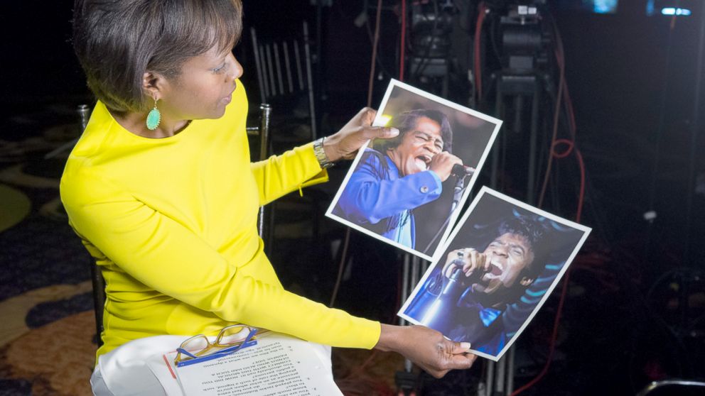 PHOTO: ABC's Deborah Roberts holds a photo of the real James Brown next to a photo of actor Chadwick Boseman playing the music legend in the new biopic, "Get On Up."