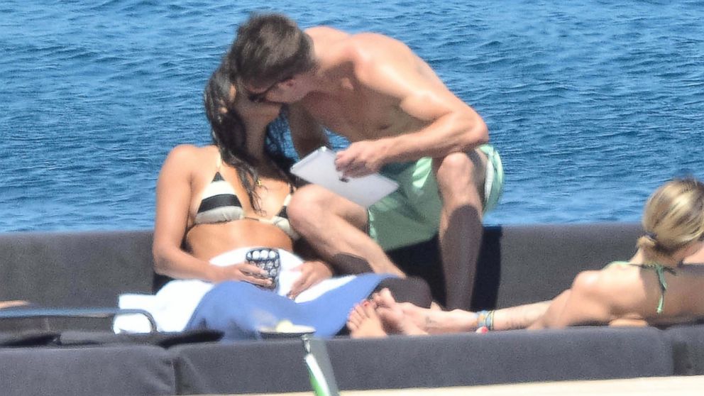 Couple Zac Efron and Michelle Rodriguez are seen in Sardinia, Italy on July 4, 2014. 