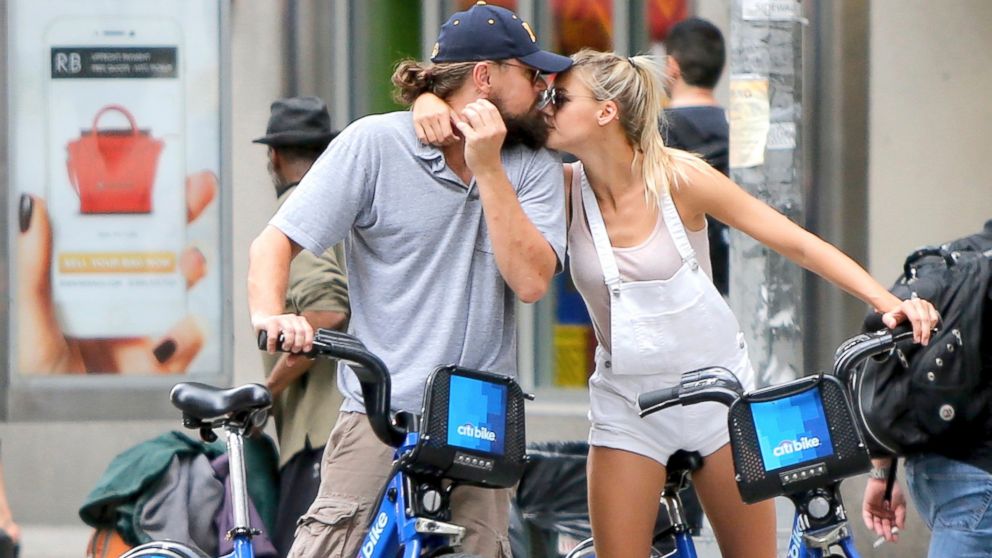 Leonardo DiCaprio gets close with new girlfriend, model Kelly Rohrbach, and share a sweet kiss while out riding Citi Bikes, June 9, 2015, in New York City.