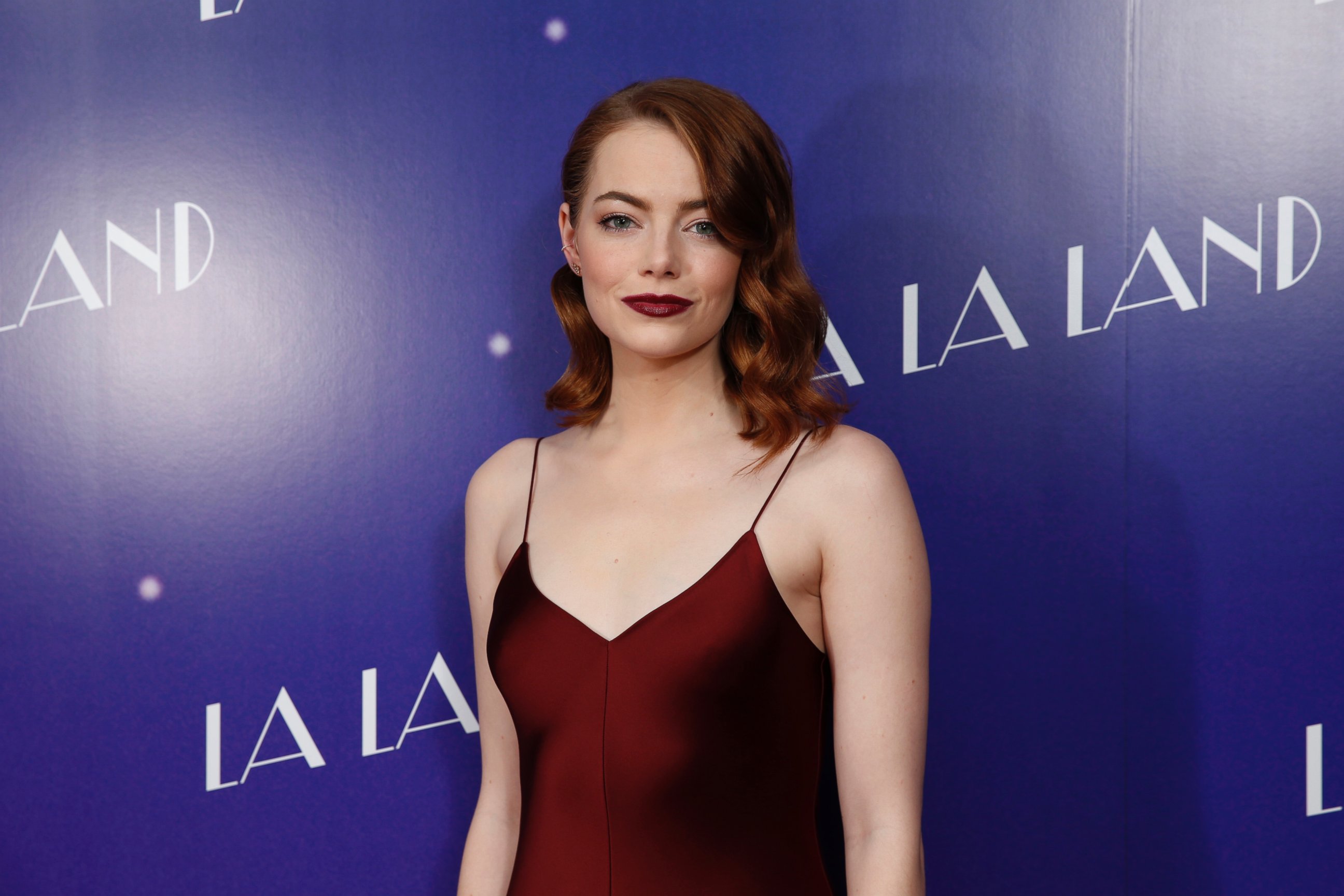 PHOTO: Actress Emma Stone poses for photographers upon arrival at the screening of the film "La La Land" in London, Jan. 12, 2017.