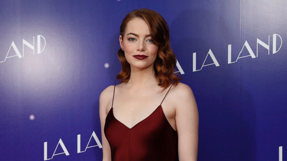 Actress Emma Stone poses for photographers upon arrival at the screening of the film "La La Land" in London, Jan. 12, 2017.