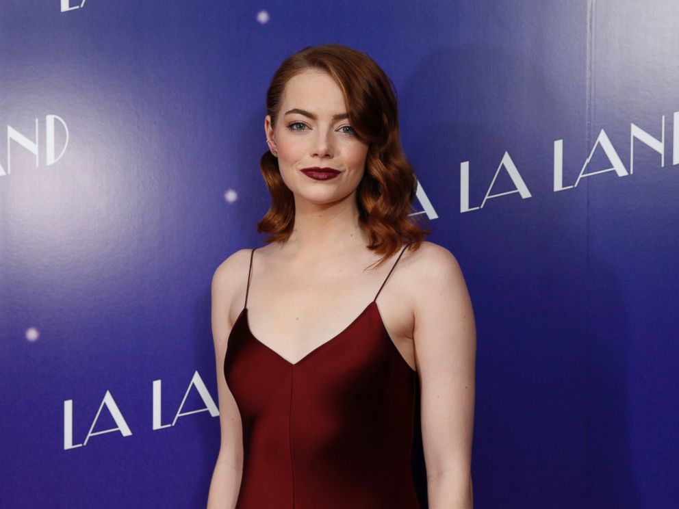 PHOTO: Actress Emma Stone poses for photographers upon arrival at the screening of the film La La Land in London, Jan. 12, 2017.