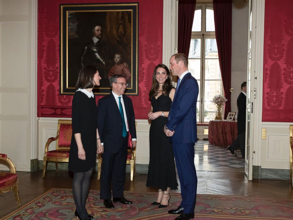 PHOTO: Britains ambassador to France, Lord Ed Llewellyn, second left, and his wife Anne, greet Prince William and Kate, Duchess of Cambridge as they arrive for a reception at the British embassy in Paris, March 17, 2017.