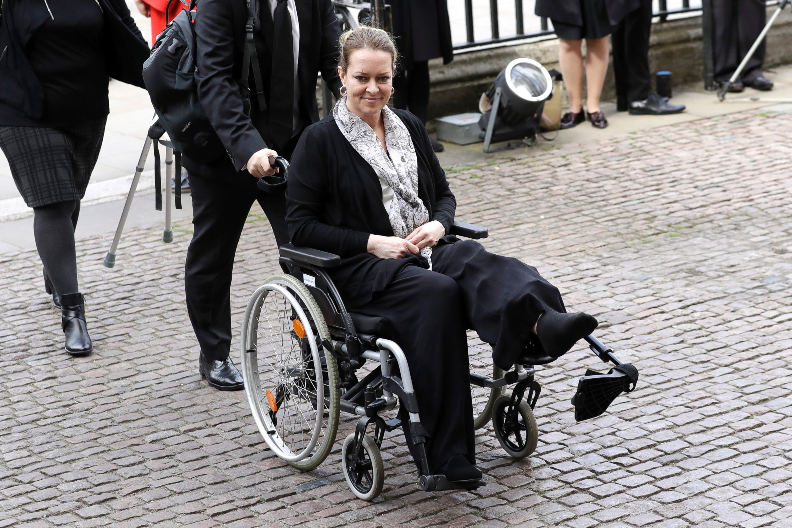 PHOTO: Injured U.S. tourist Melissa Cochran, whose husband Kurt Cohran was killed in the March 22 London terror attack, arrives for a "Service of Hope" at Westminster Abbey in London, April 5, 2017. 
