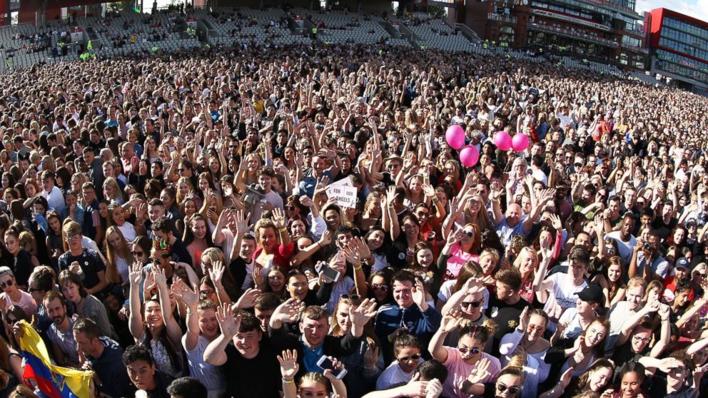 Members of the crowd are pictured at the One Love Manchester tribute concert in Manchester, north western England, June 4, 2017. 