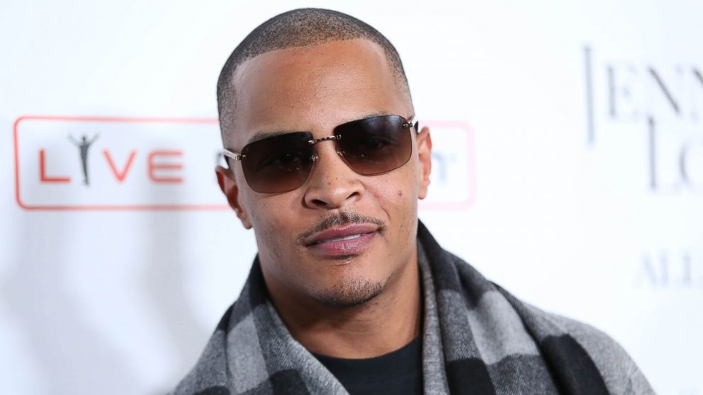 In this Jan. 20, 2016, file photo, T.I. arrives at the grand opening of "Jennifer Lopez: All I Have" show at Planet Hollywood Resort & Casino in Las Vegas. According to authorities several people were shot at a T.I concert in New York, Wednesday, May 25, 2016. 