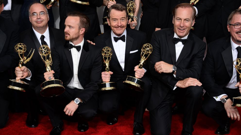 Co-executive producer Thomas Schnauz, from left, Aaron Paul, Bryan Cranston and Bob Odenkirk pose in the press room with the award for outstanding drama series for "Breaking Bad" at the 66th Annual Primetime Emmy Awards at the Nokia Theatre L.A. Live, Aug. 25, 2014, in Los Angeles.