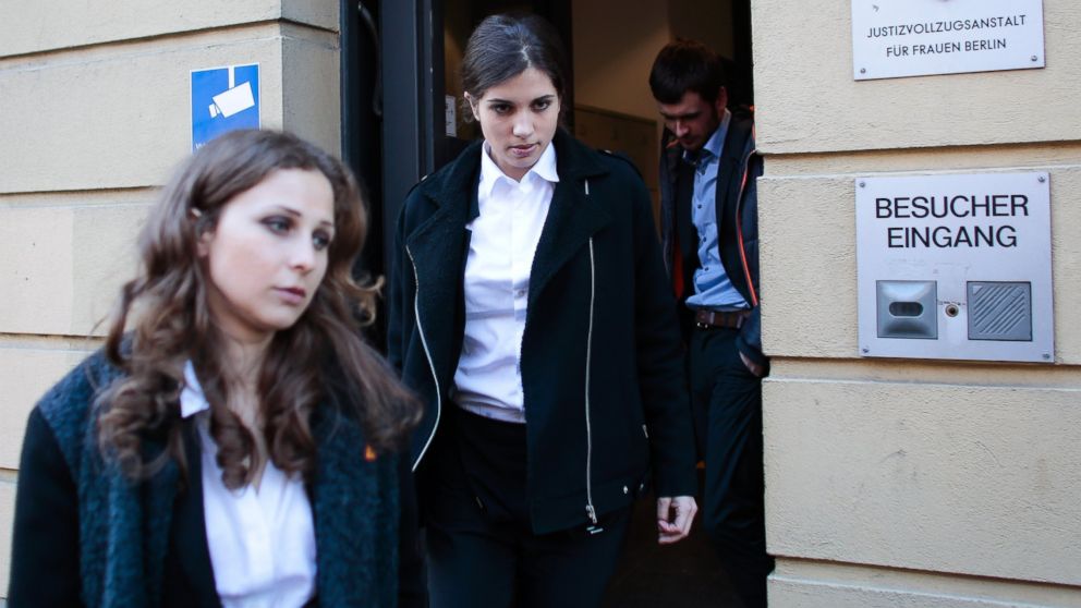 PHOTO: Nadezhda Tolokonnikova, center, and Maria Alekhina, left,  members of  Russian punk band Pussy Riot,  leave after a  visit to the women's  prison at the district Lichtenberg in Berlin, Germany, Tuesday, Feb. 11, 2014.