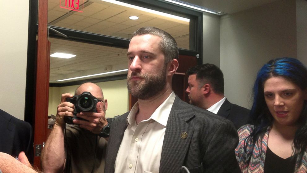 Television actor Dustin Diamond, center, exits the courtroom in Port Washington, Wis., Friday night, May 29, 2015, after a 12-person jury convicted him of two misdemeanors stemming from a barroom fight, but a Wisconsin jury cleared the former "Saved by the Bell" actor of the most serious felony charge. 