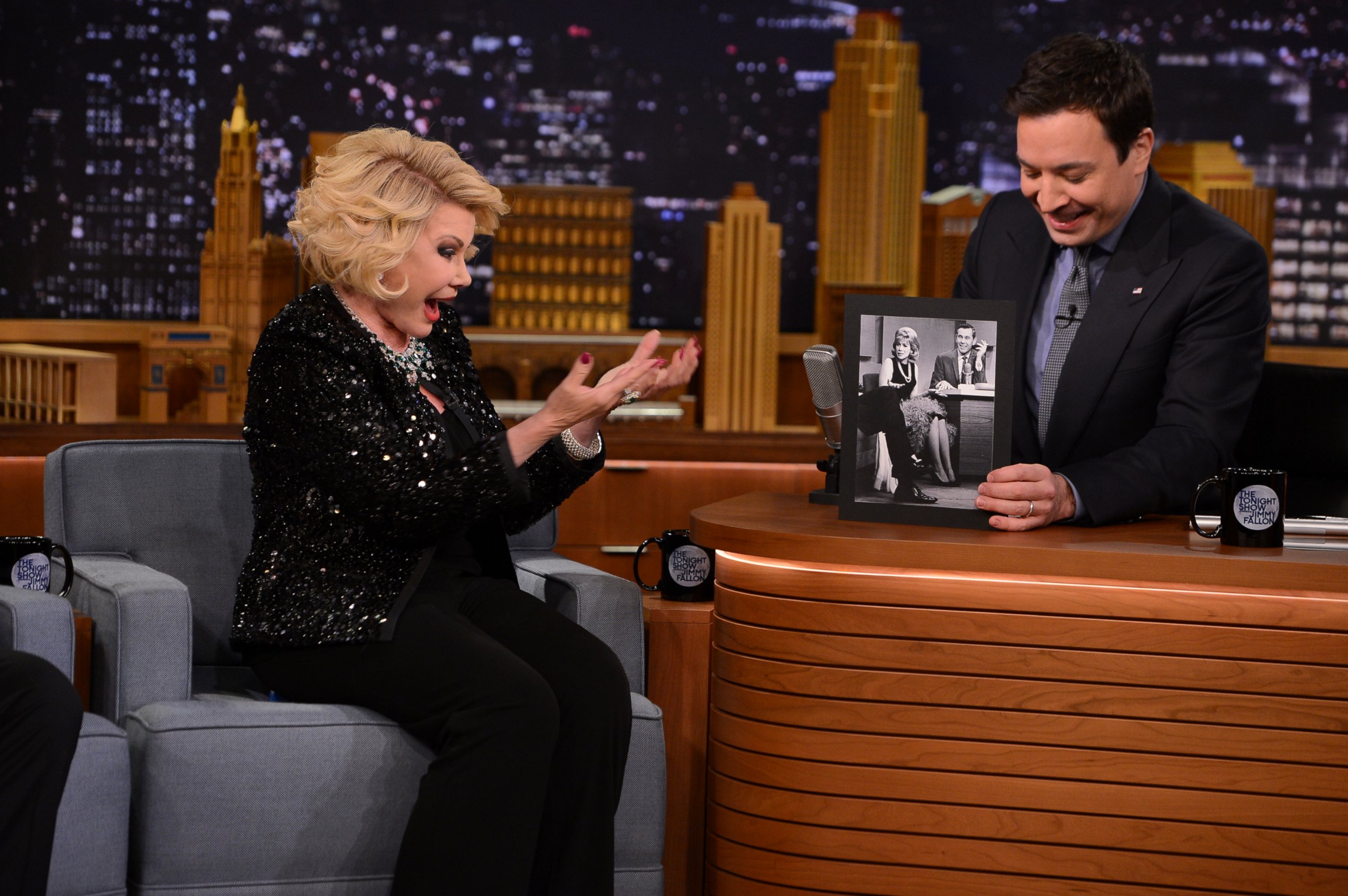 PHOTO: This March 27, 2014 photo released by NBC shows comedian Joan Rivers, left, with host Jimmy Fallon, during an appearance on "The Tonight Show Starring Jimmy Fallon," in New York.