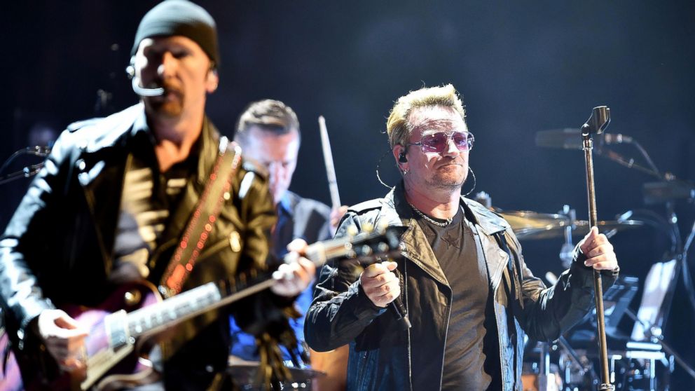 In this photo taken on Friday, Sept. 4, 2015, Bono Vox, right, leader of Irish rock band U2, performs in Turin, Italy, on the occasion of the band's opening of their European tour.