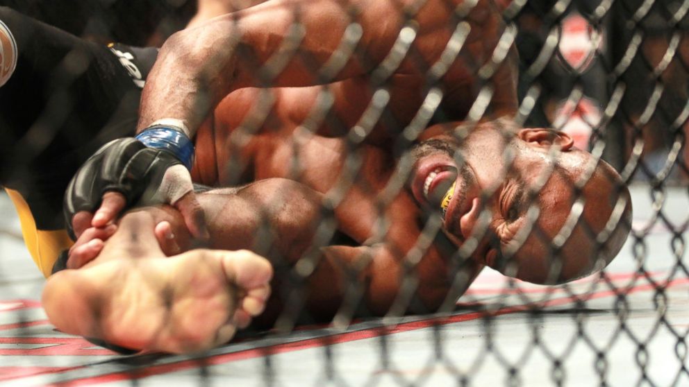 Anderson Silva, of Brazil, screams after kicking Chris Weidman of Baldwin, N.Y., and injuring his leg during the UFC 168 mixed martial arts middleweight championship bout on Saturday, Dec. 28, 2013, in Las Vegas.