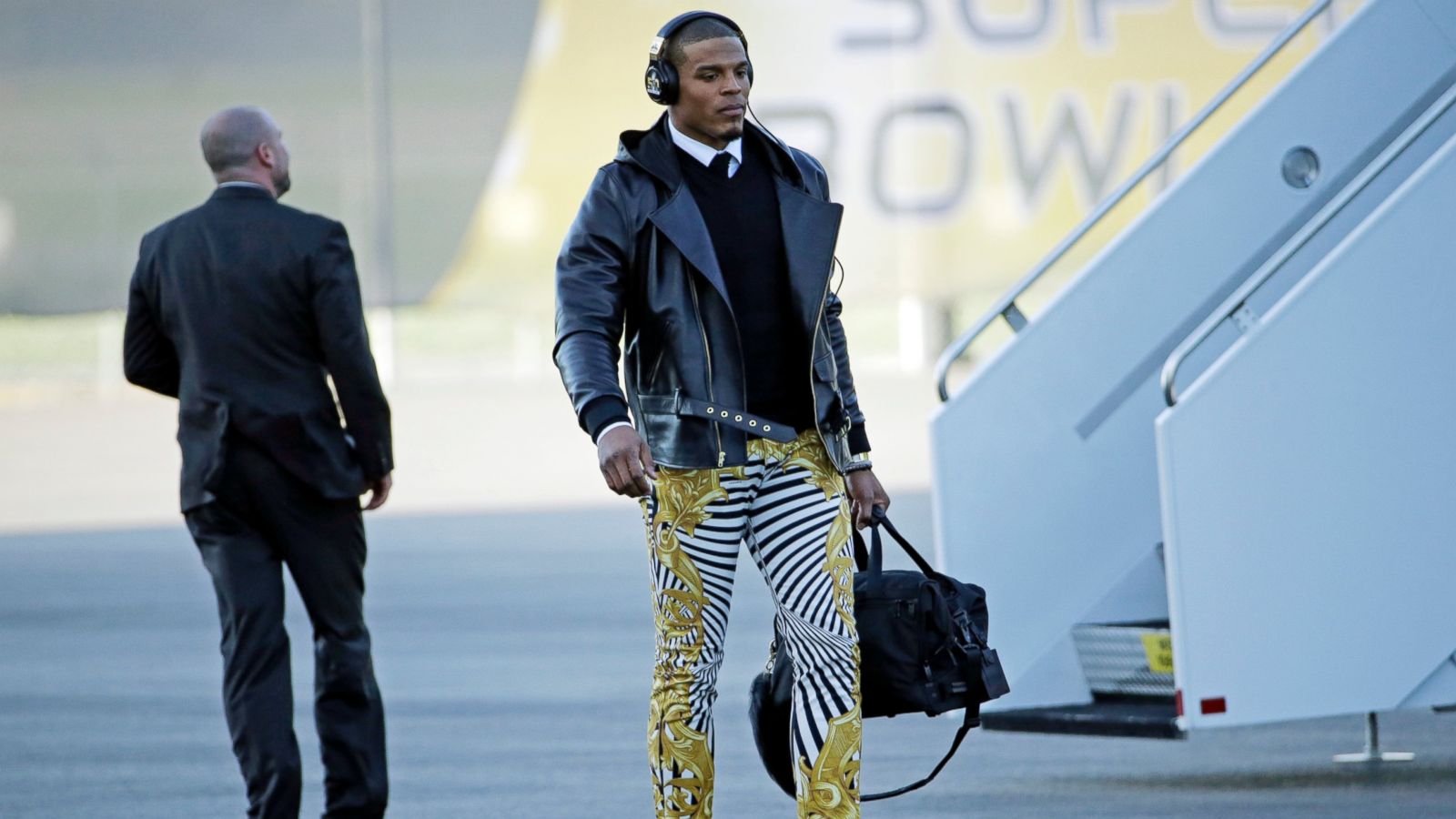 Cam Newton kicks off Super Bowl week in style with amazing gold zebra print  pants