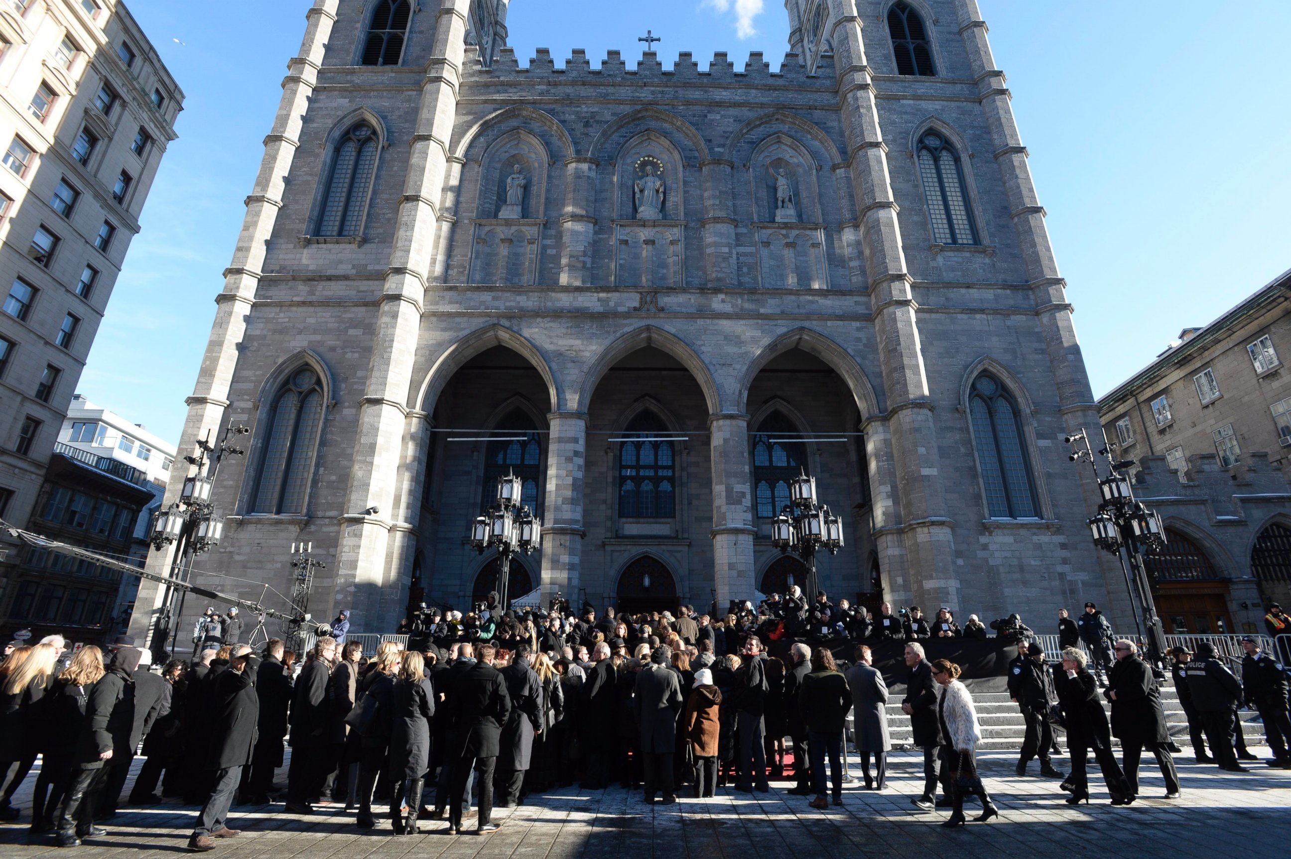 PHOTO: People gather at Notre-Dame Basilica in Montreal on Jan. 22, 2016, for the funeral for Rene Angelil, late husband of Celine Dion, who died on Jan. 14, at the age of 73.
