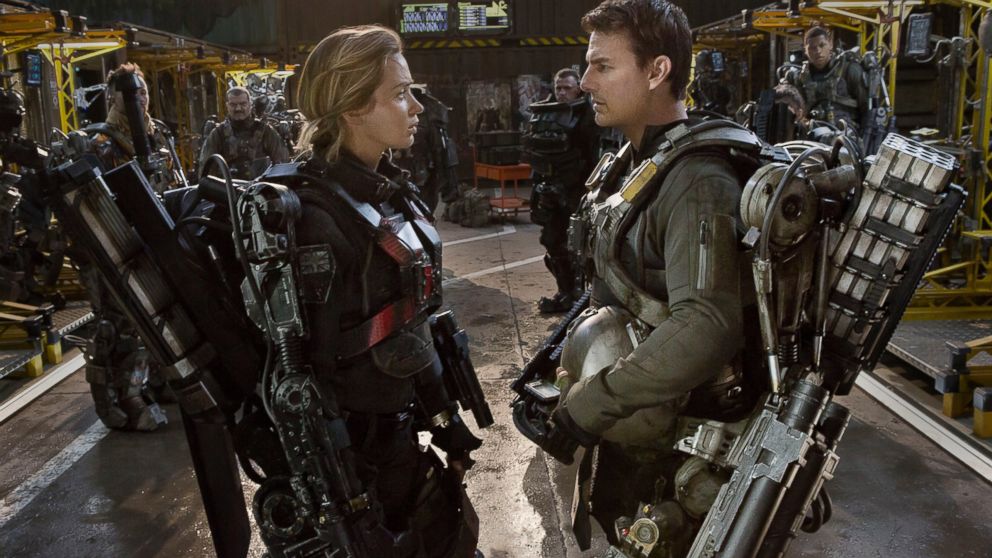 Emily Blunt, left, as Rita and Tom Cruise as Cage, in Warner Bros. Pictures' and Village Roadshow Pictures' sci-fi thriller "Edge of Tomorrow." 