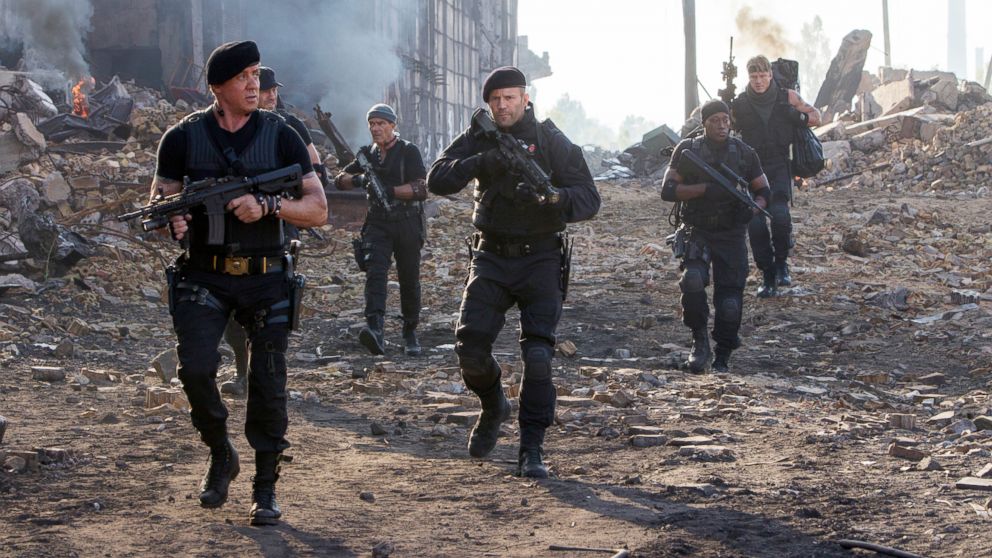 PHOTO: Sylvester Stallone, left, and Jason Statham, center, in a scene from "Expendables 3." 
