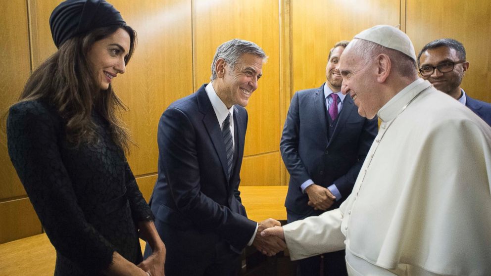 PHOTO: Pope Francis meets actor George Clooney and his wife Amal, at a meeting with the Scholas Occurrentes, an educational organization founded by Pope Francis, at the Vatican, May 29, 2016.
