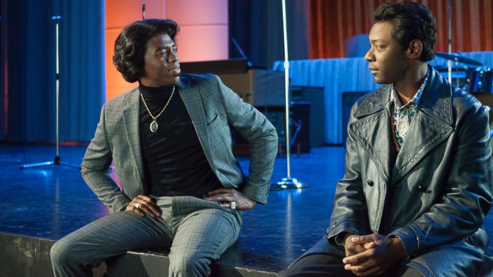 Chadwick Boseman, left, and Nelsan Ellis in a scene from "Get On Up."