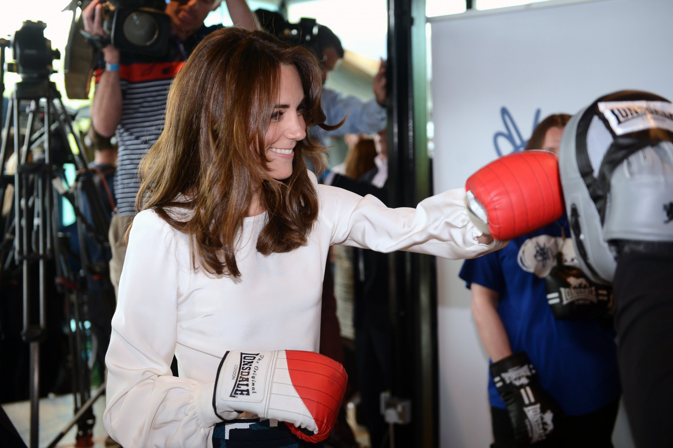 PHOTO:Kate, the Duchess of Cambridge, boxes with former boxer Duke McKenzie during the launch of Heads Together, the ambitious new campaign to end stigma on mental health, at the Olympic Park in London, May 16, 2016.  